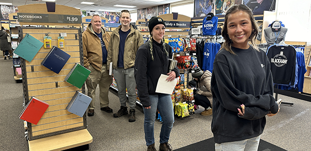 People waiting in line at the campus bookstore